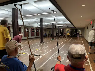 Floor shuffleboard game at the McDonnel Street Community Centre