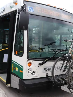 A bus with bike racks on the front